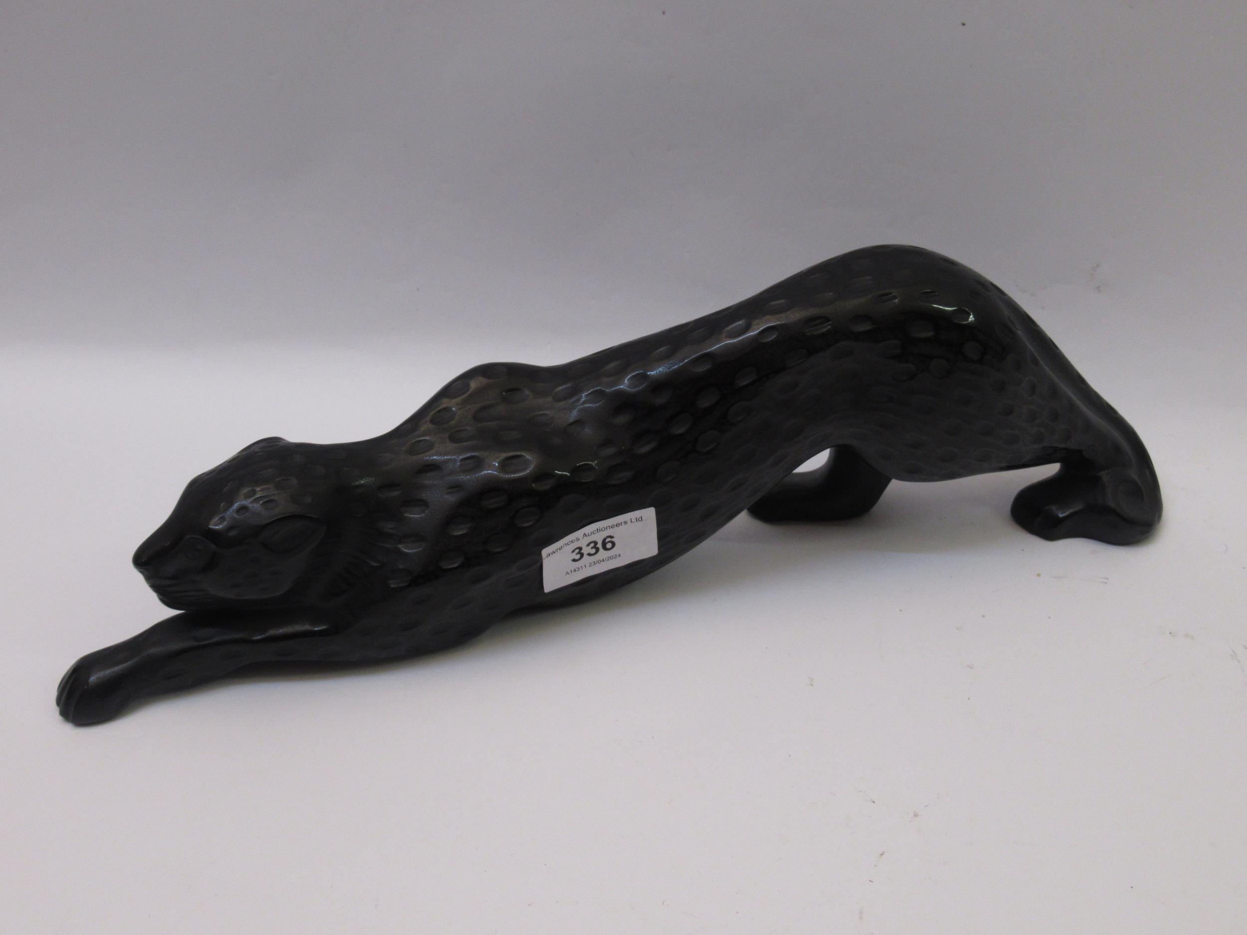 Modern Lalique black glass figure of a leopard, signed, 37cm long Good condition with no damages. No