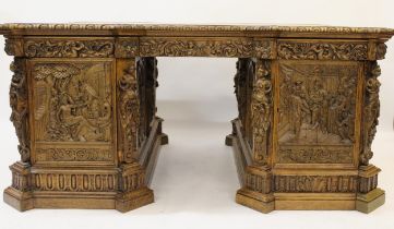 Fine oak twin pedestal partner's desk, the shaped red tooled leather inset top above shallow