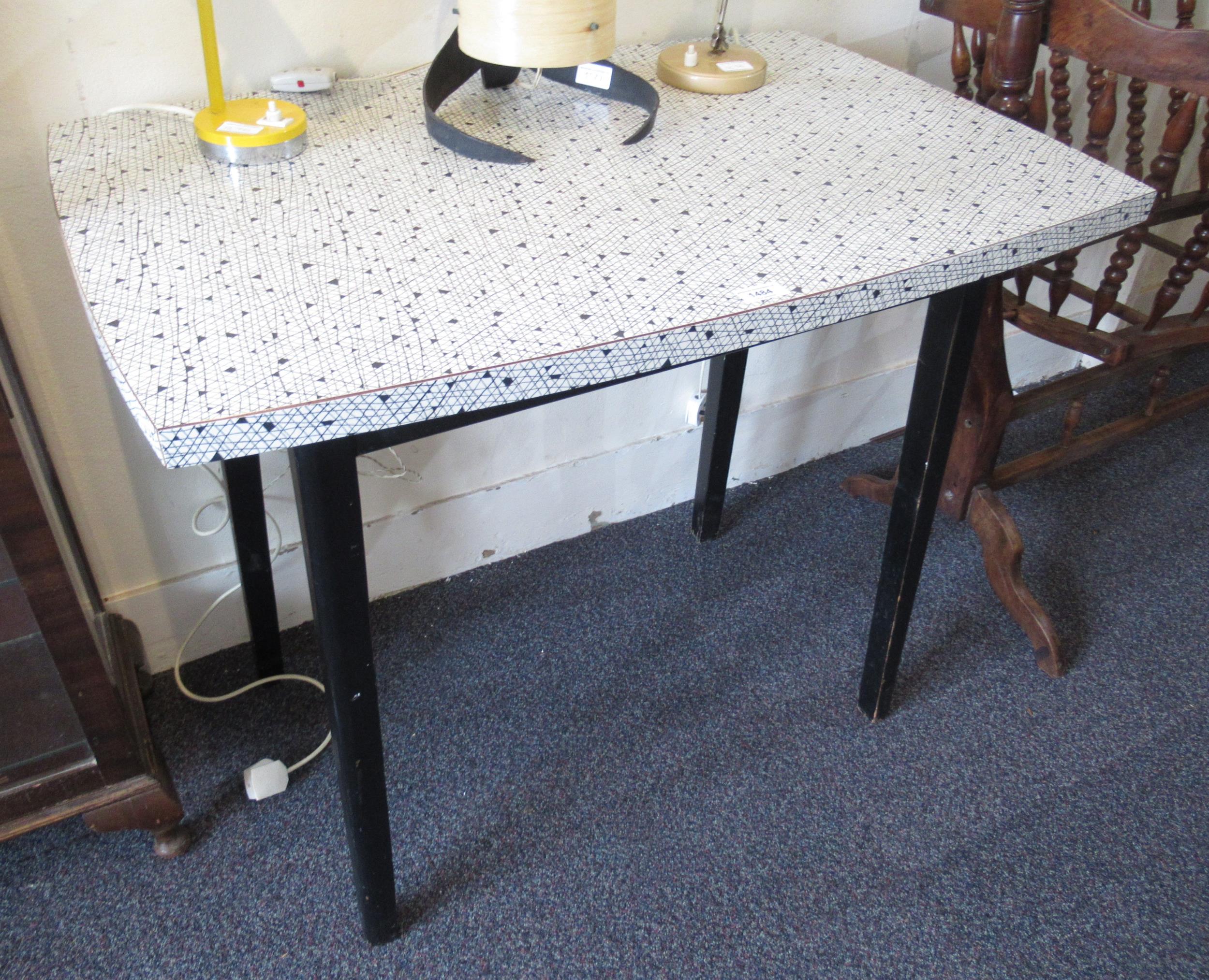 Mid 20th Century Italian Formica top kitchen table, raised on ebonised supports, 93 x 60 x 77cm high