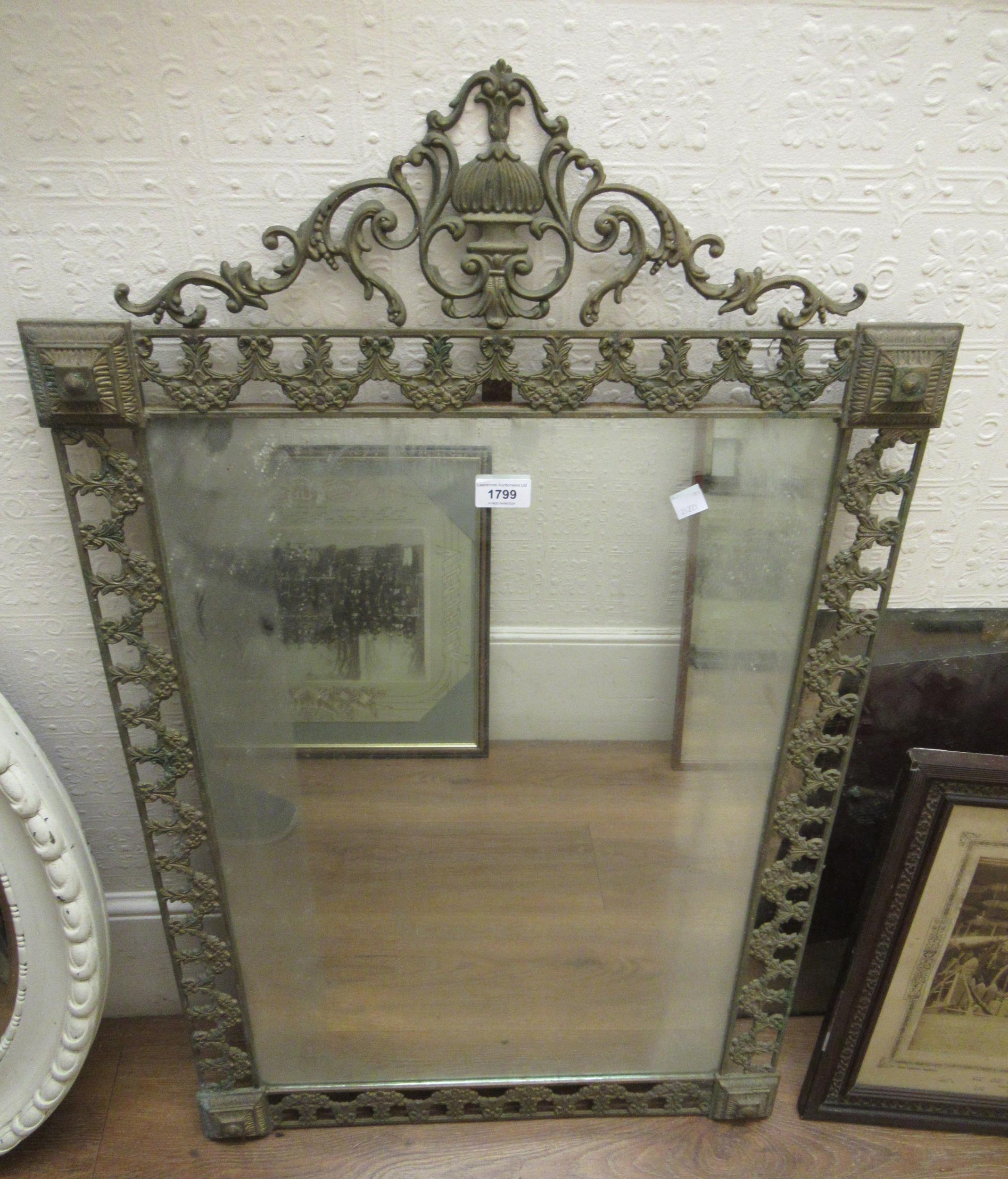 Reproduction pierced brass wall mirror, 96cm high, together with a copper kettle
