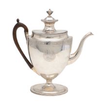 A GEORGE III VASE-SHAPED SILVER COFFEE POT.
