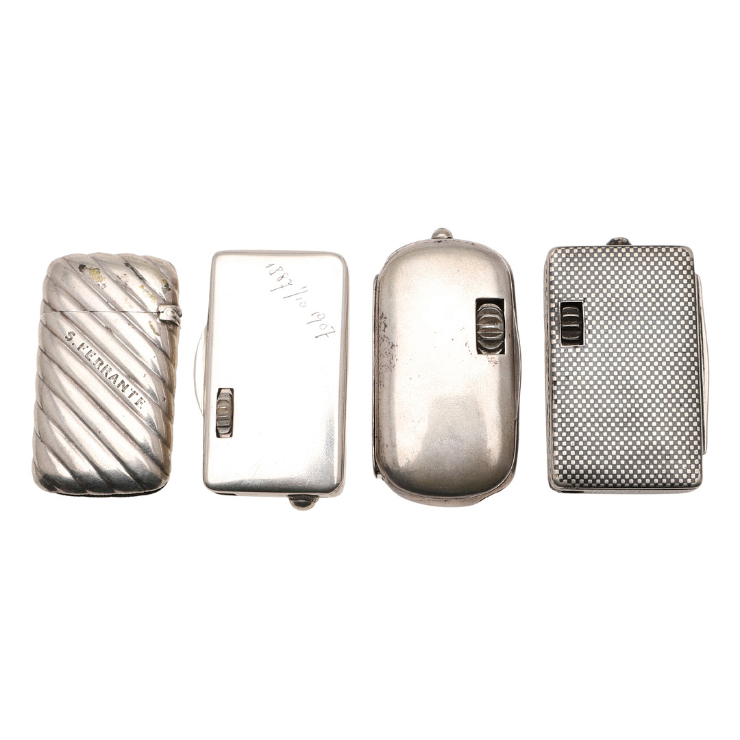 FOUR CONTINENTAL SILVER VESTA CASES.