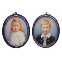 A PAIR OF EDWARDIAN MINIATURE PORTRAITS.