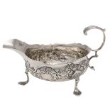 A GEORGE III SILVER SAUCE BOAT.