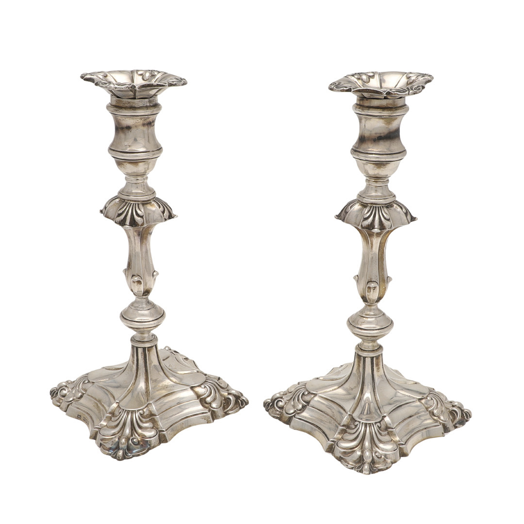 A PAIR OF GEORGE V SILVER CANDLESTICKS, BY GARRARD & CO. LTD.