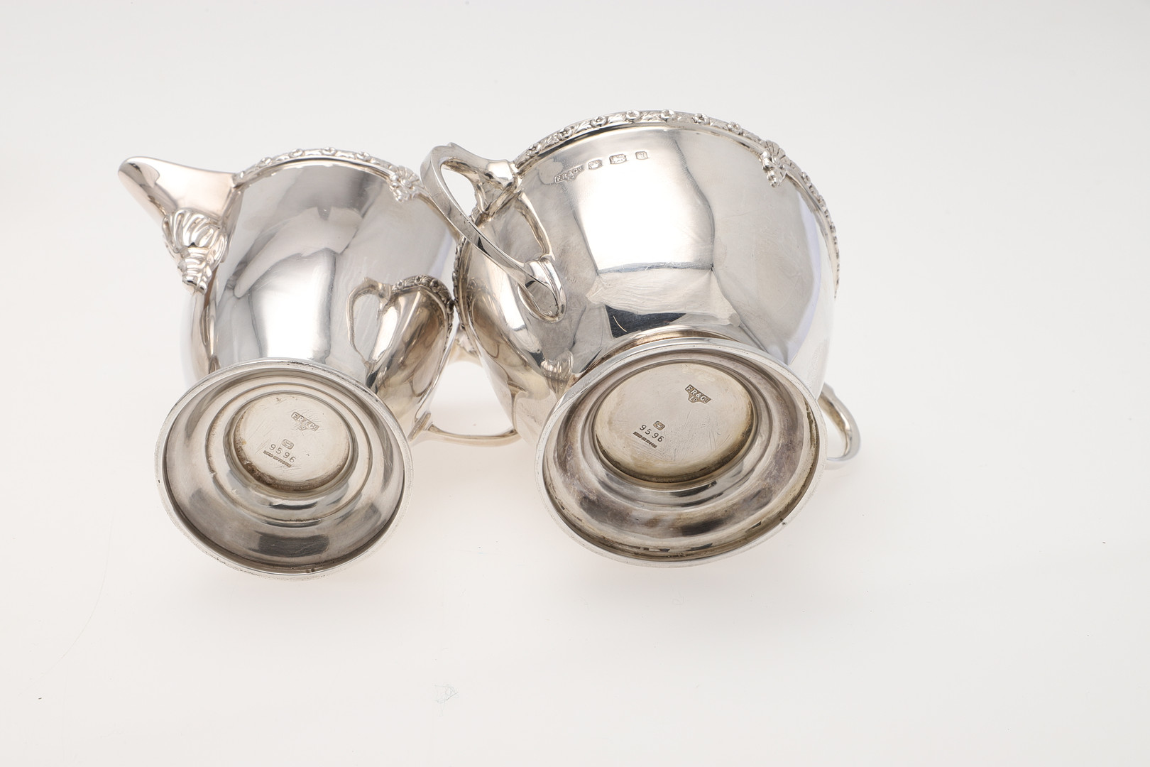 AN EARLY 20TH CENTURY FOUR-PIECE SILVER TEA SET. - Image 4 of 7