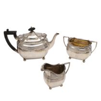 A VICTORIAN SILVER THREE-PIECE TEA SET.