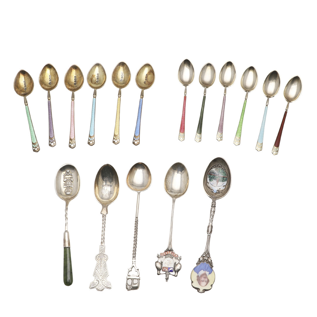 TWO CASED SETS OF SIX SILVER & ENAMEL TEA/ COFFEE SPOONS.