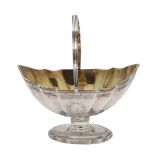 A GEORGE III SILVER SWING-HANDLED SUGAR BASKET.