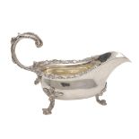 A GEORGE IV SILVER SAUCE BOAT.