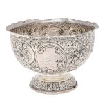 AN EDWARDIAN SILVER ROSE BOWL.