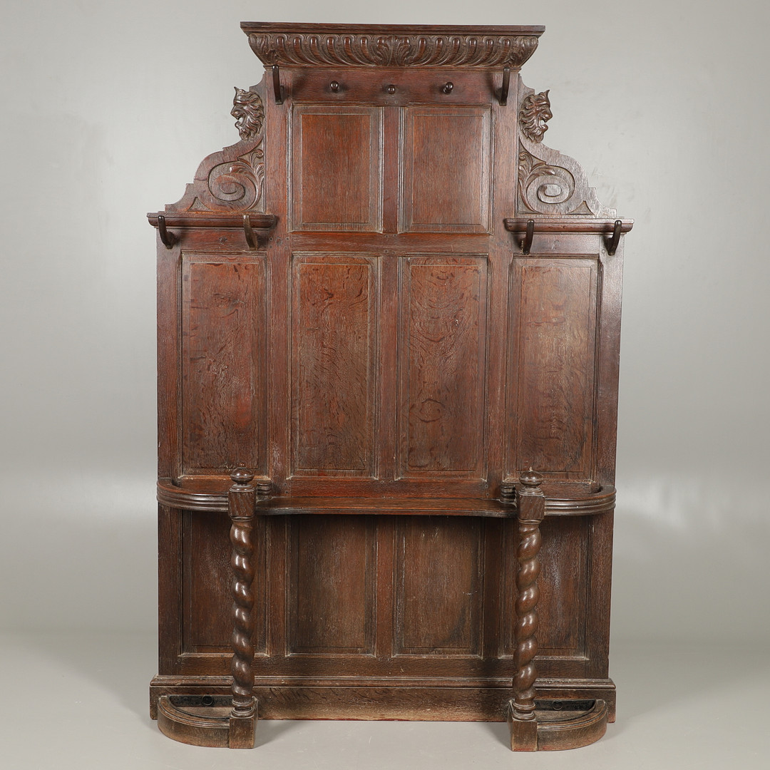 A LARGE CARVED OAK COUNTRY HOUSE HALLSTAND.