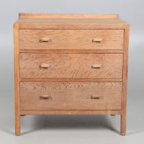 A HEALS & SON LIMED OAK CHEST OF DRAWERS.