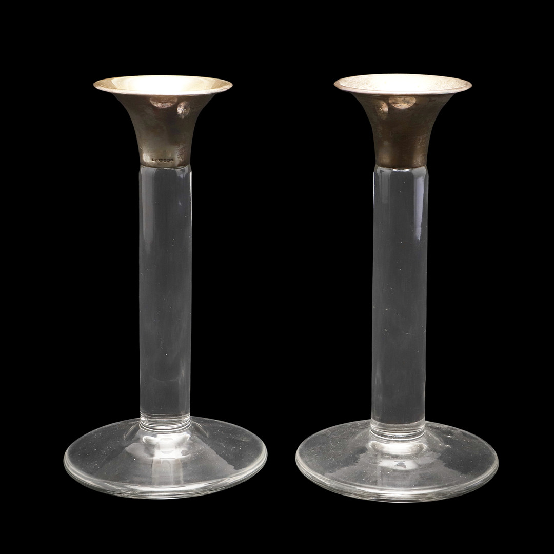 PAIR OF CONTEMPORARY SILVER TOP & GLASS CANDLESTICKS.