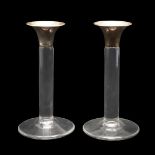 PAIR OF CONTEMPORARY SILVER TOP & GLASS CANDLESTICKS.