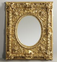 A SUBSTANTIAL ITALIAN GILT GESSO MIRROR.