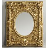 A SUBSTANTIAL ITALIAN GILT GESSO MIRROR.