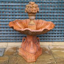 A VICTORIAN STYLE COMPOSITE STONE FOUNTAIN.