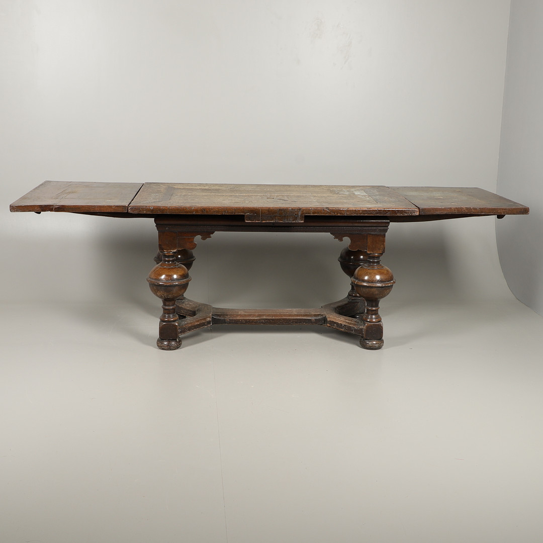 AN ANTIQUE DUTCH OAK AND WALNUT DRAW LEAF TABLE.