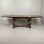 AN ANTIQUE DUTCH OAK AND WALNUT DRAW LEAF TABLE.