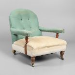 A LATE 19TH CENTURY DEEP SEATED PITCH PINE ARMCHAIR.