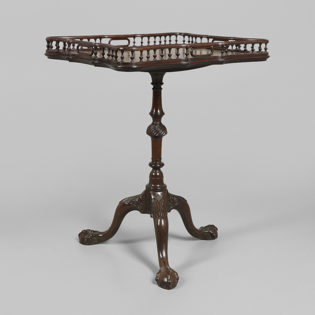 A GEORGE III STYLE MAHOGANY TRAY TOP TRIPOD TABLE.