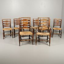 A MATCHED SET OF EIGHT ELM AND ASH LADDERBACK CHAIRS.