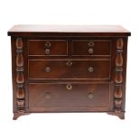 A MAHOGANY TABLE TOP CHEST OF DRAWERS.