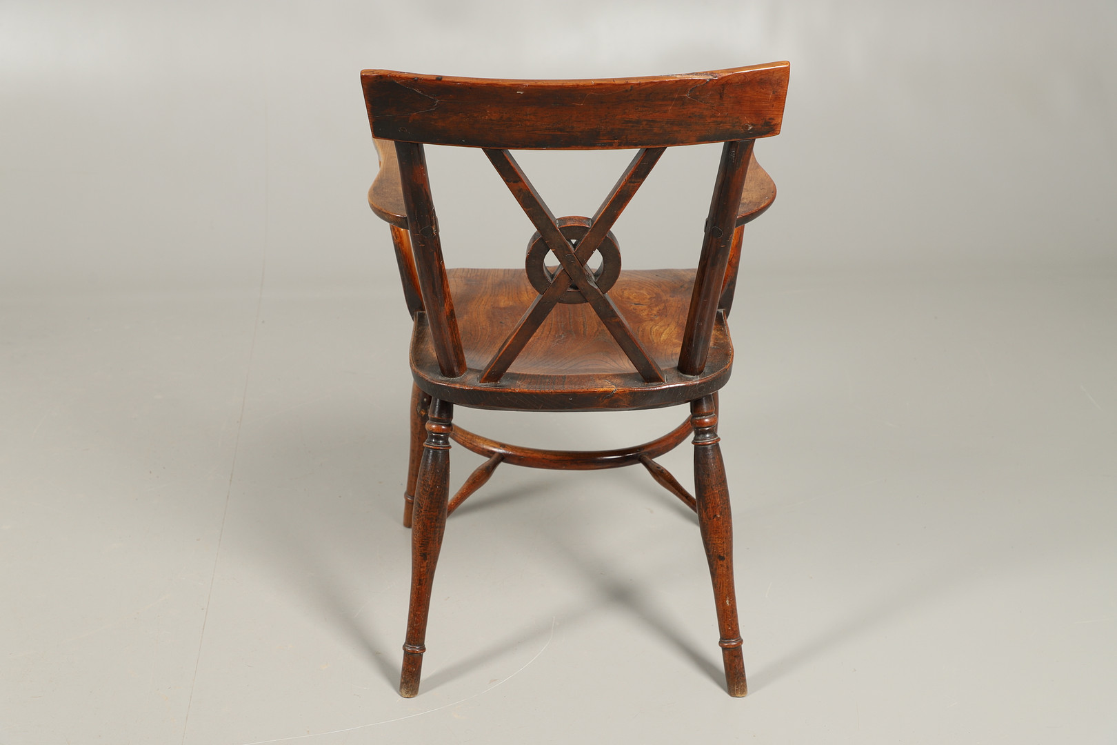 A YEW AND ELM WINDSOR ELBOW CHAIR. - Image 8 of 13