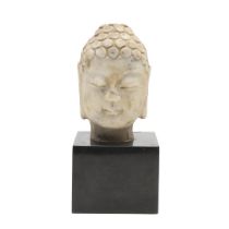 ANTIQUE CARVED BUDDHA HEAD.