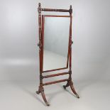 A REGENCY MAHOGANY CHEVAL MIRROR.