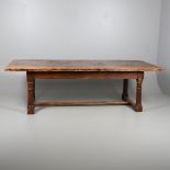 AN EARLY 20TH CENTURY OAK AND ELM REFECTORY TABLE.