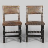 A PAIR OF 17TH CENTURY OAK BACKSTOOLS.