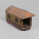 A FOLK ART POLYCHROME PAINTED DOG KENNEL.