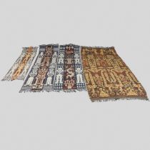 FOUR INDONESIAN SUMBA IKAT COTTON TEXTILE PANELS.