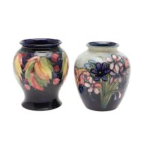 TWO EARLY MOORCROFT VASES.