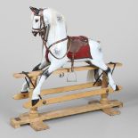 A STEVENSON BROTHERS DAPPLE GREY ROCKING HORSE.