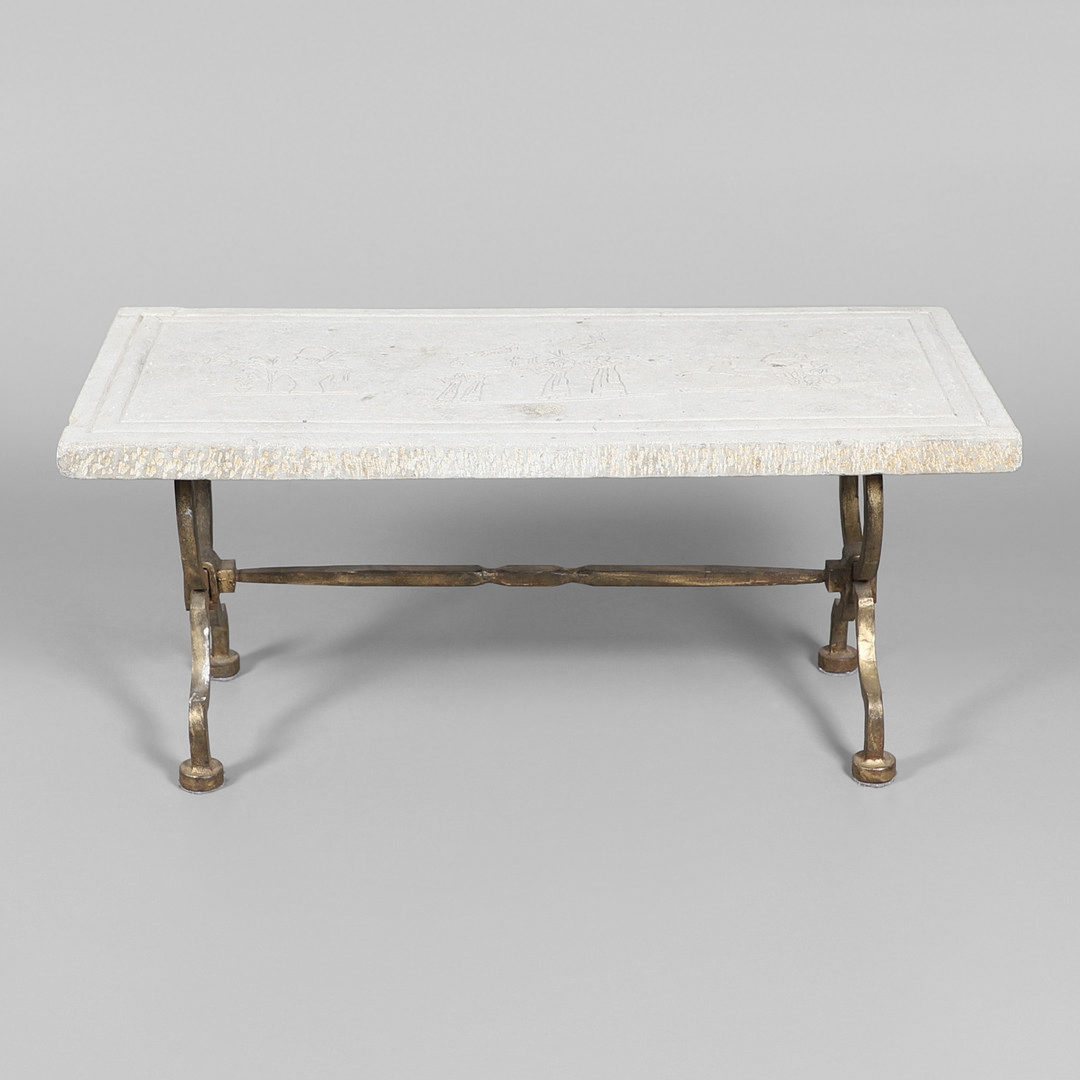 GILBERT POILLERAT - CARVED STONE & GILT IRON COFFEE TABLE.