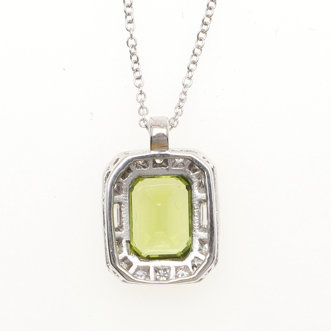 A PERIDOT AND DIAMOND CLUSTER PENDANT. - Image 2 of 3