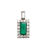 AN EMERALD AND DIAMOND PENDANT.