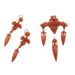 A VICTORIAN CARVED CORAL BROOCH AND A PAIR OF DROP EARRINGS.