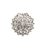 A DIAMOND FLOWERHEAD BROOCH PENDANT.