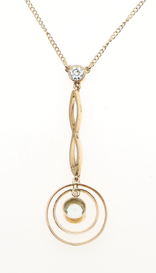 AN AQUAMARINE AND GOLD PENDANT. - Image 2 of 3