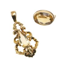 A CITRINE AND GOLD PENDANT.