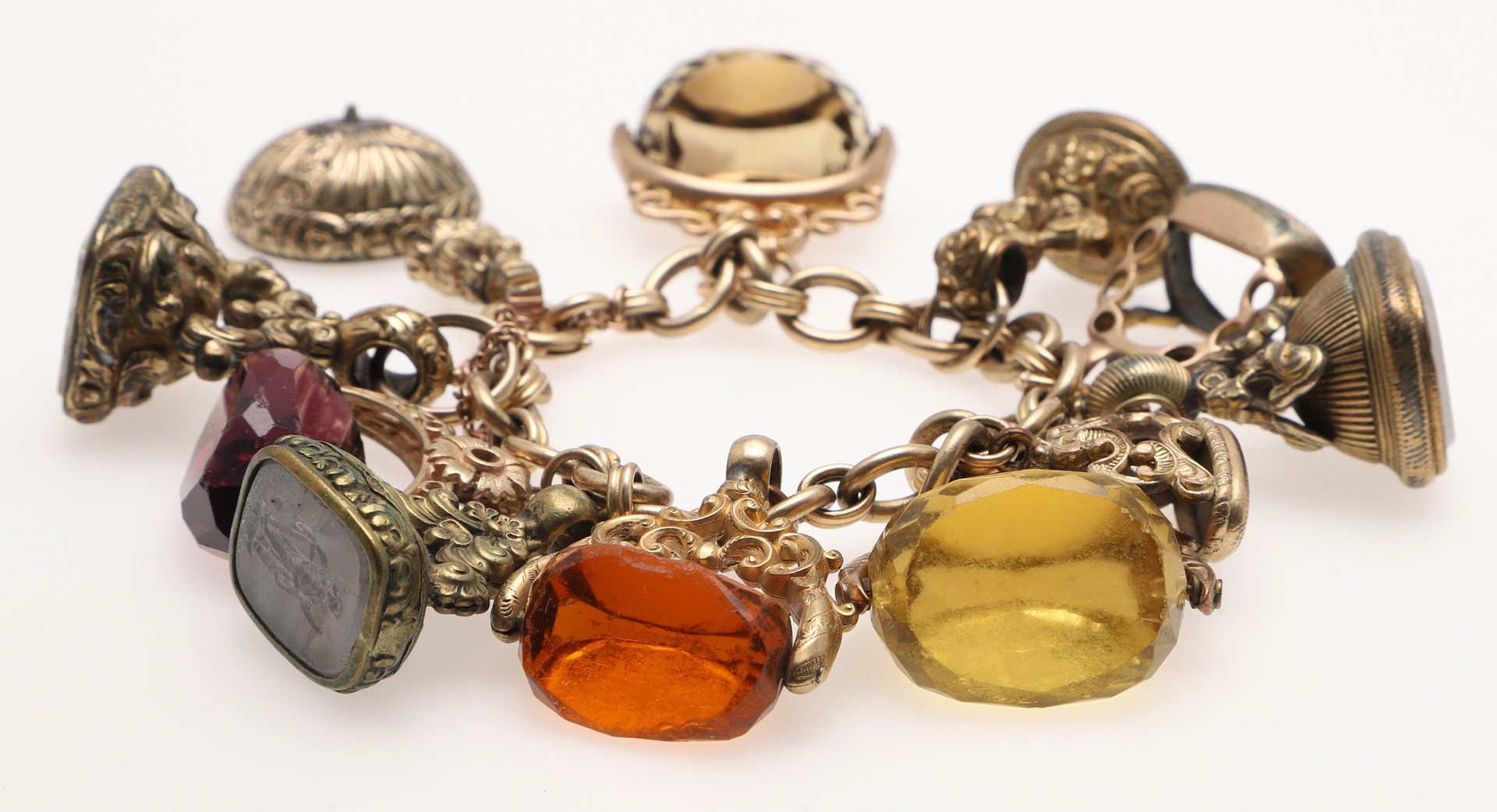 A 9CT GOLD BRACELET SUSPENDING VARIOUS ANTIQUE AND OTHER SEALS. - Image 3 of 5