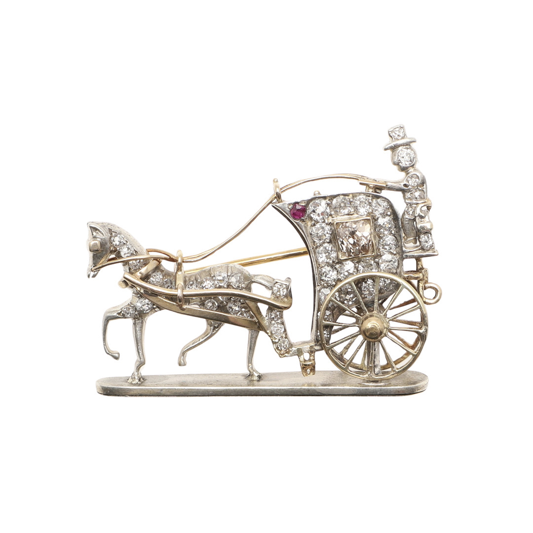 A LATE 19TH CENTURY DIAMOND CARRIAGE AND HORSE BROOCH.