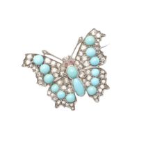 AN EARLY 20TH CENTURY TURQUOISE AND DIAMOND BUTTERFLY BROOCH.