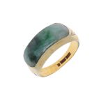 A JADE AND GOLD RING.