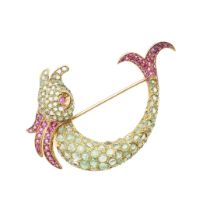 AN 18CT GOLD, RUBY AND EMERALD LEAPING FISH BROOCH.