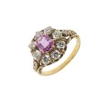 A PINK SAPPHIRE AND DIAMOND CLUSTER RING.